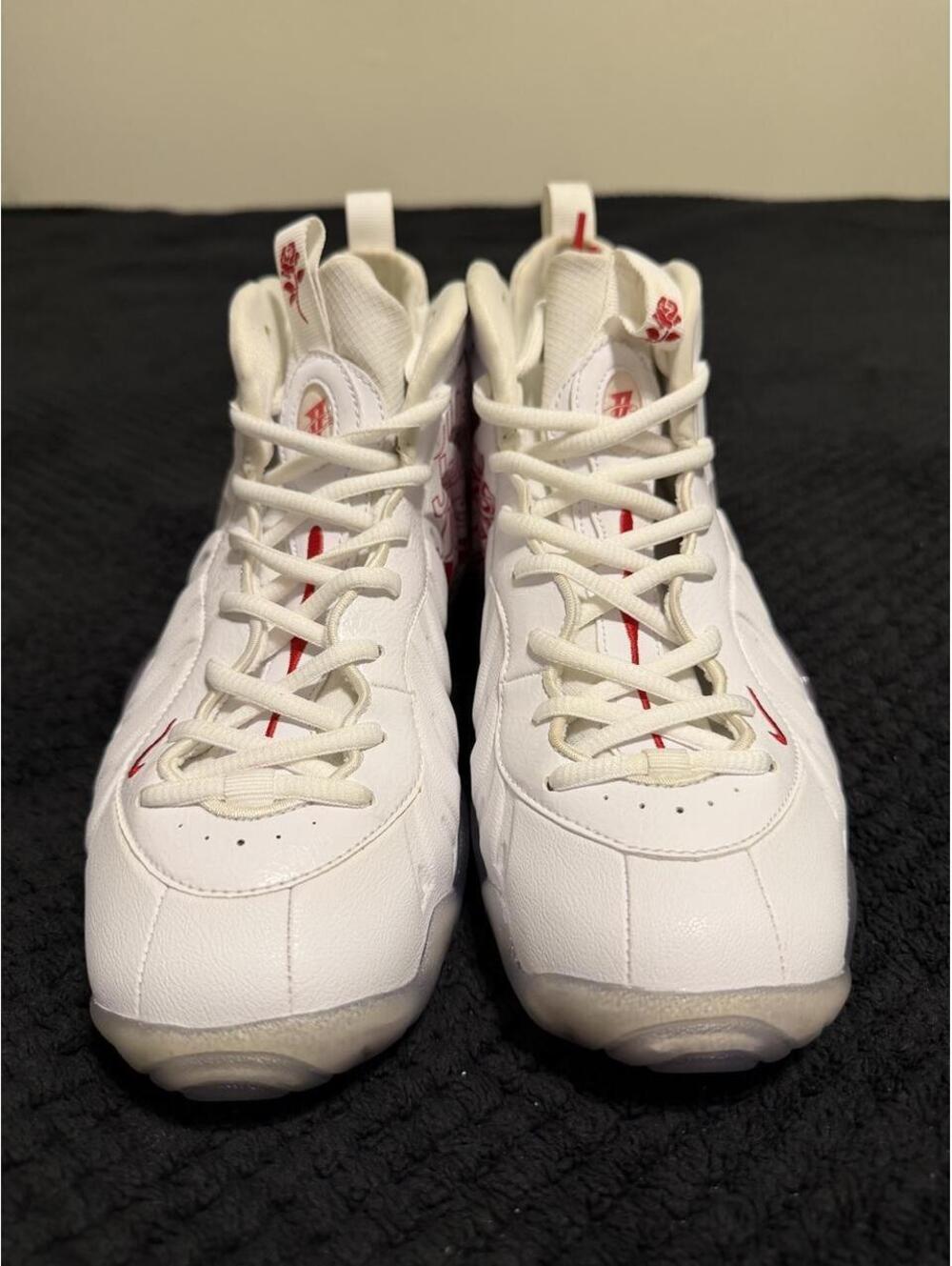 Nike Foamposite White" basketball sneakers with red accents, size US 6Y